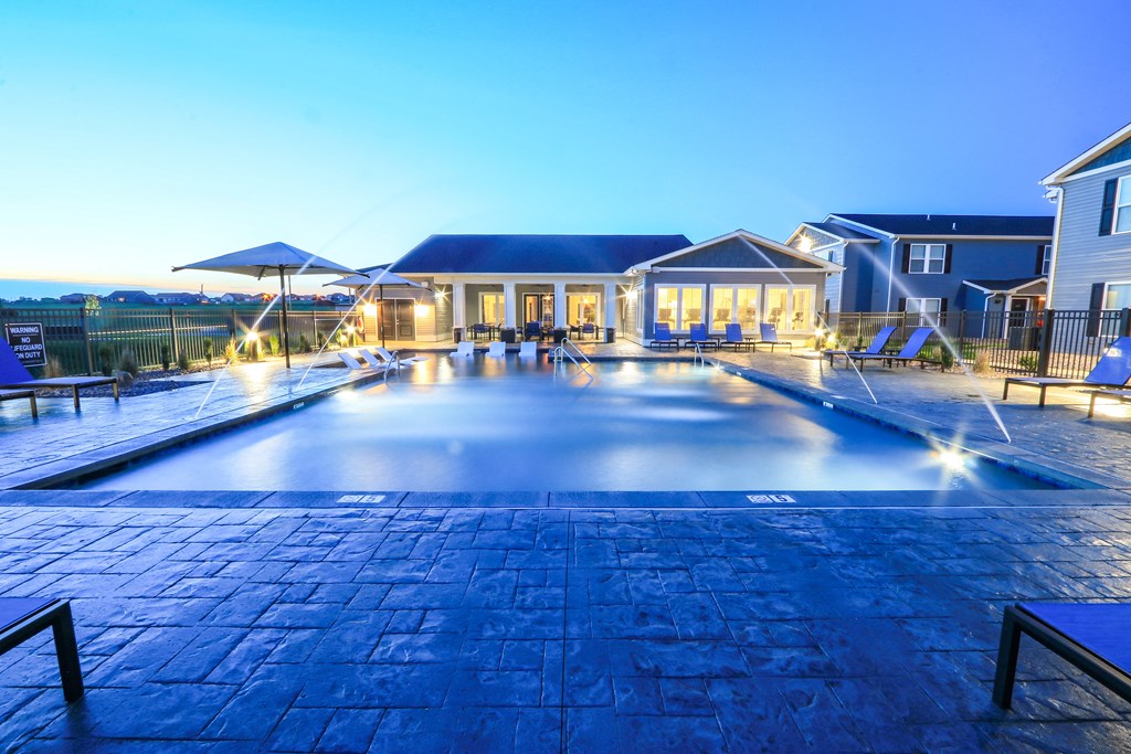 Resort-Style Pool Lit Up At Night