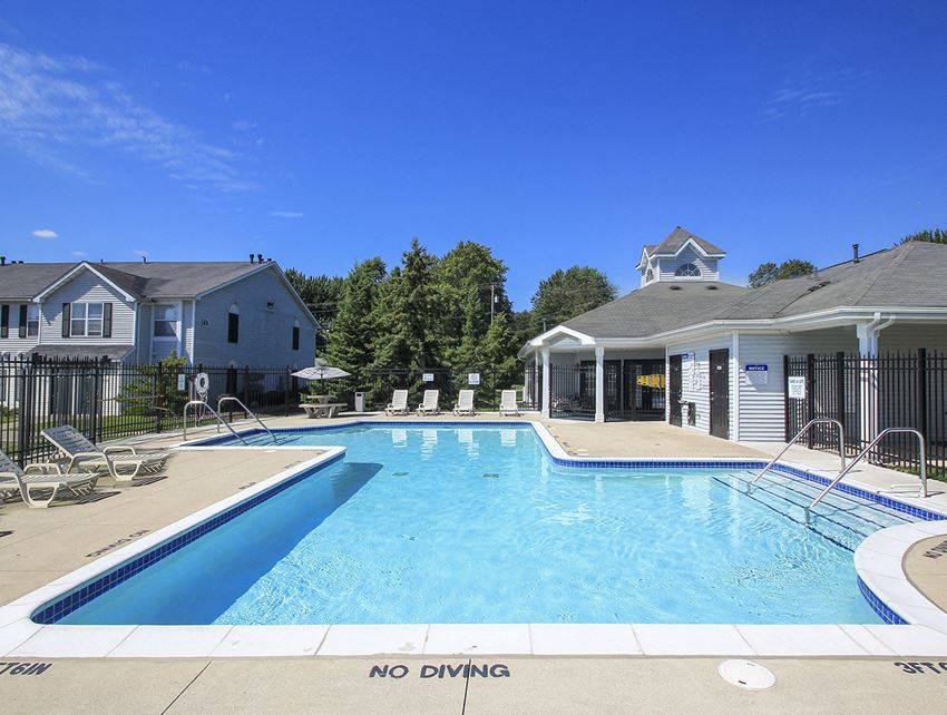 Spacious Outdoor Pool with Sundeck - Photo Gallery 1