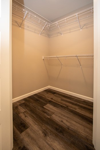 Walk-In Closet With Multiple Built-In Shelves - Photo Gallery 44