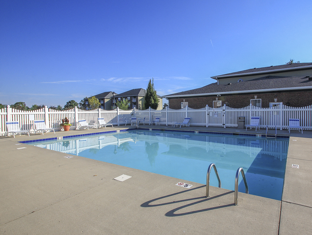 Pool and Sundeck with Lounge Chairs