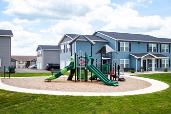 Playground With Sidewalk Surrounding The Outside - Photo Gallery 11