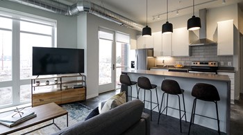 Open Concept Living Area with Large Floor to Ceiling Windows