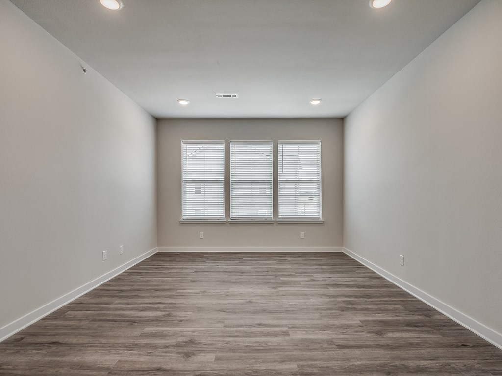 Spacious Living Room with Overhead Lighting