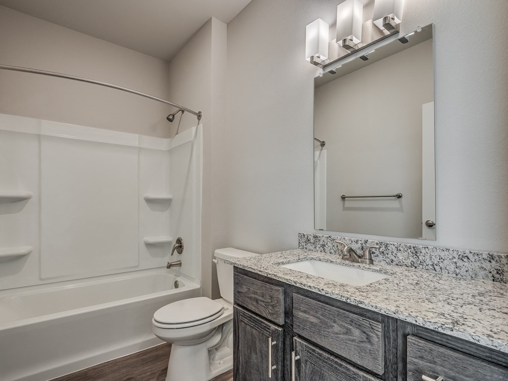 Bathroom With Granite Vanities