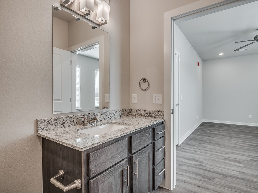 Bathroom With Granite Vanities
