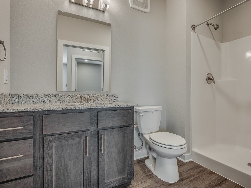 Bathroom With Granite Vanities