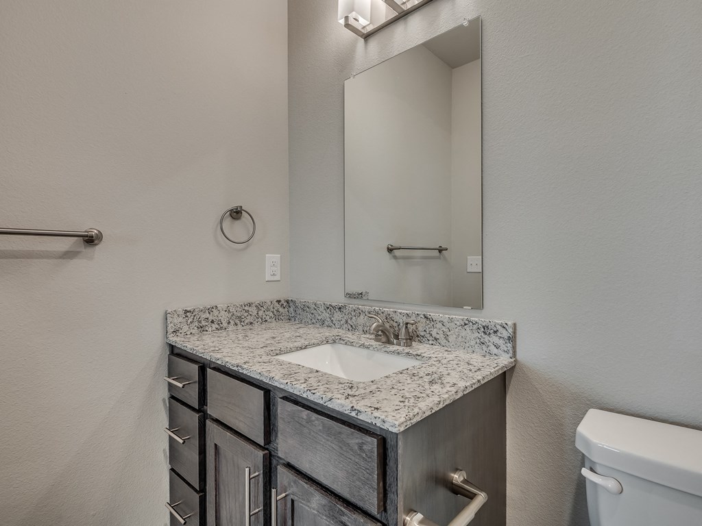 Bathroom With Granite Vanities