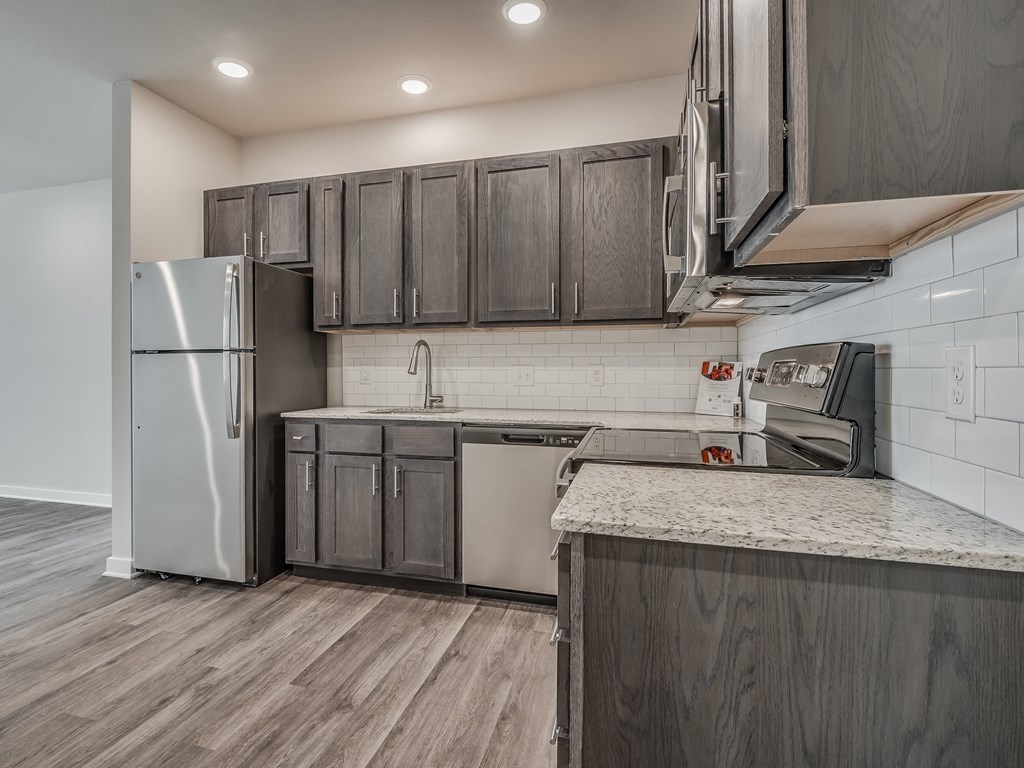 Kitchen with Granite Countertops and Stainless Steel Appliances