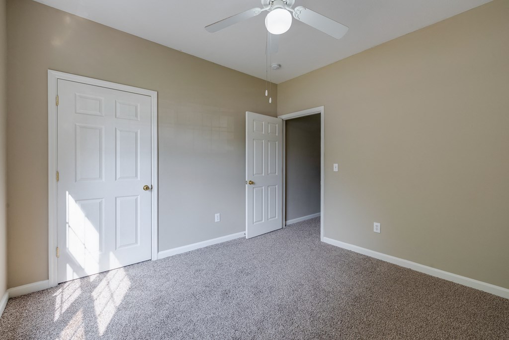 Bedroom With Ceiling Fan & Light
