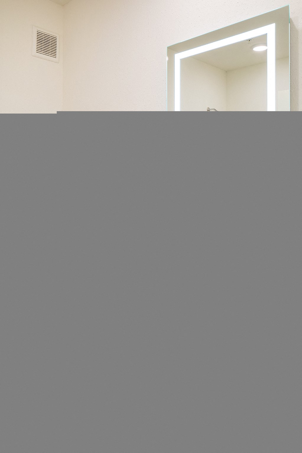 Back Lit Mirror with Large Bathroom Vanity