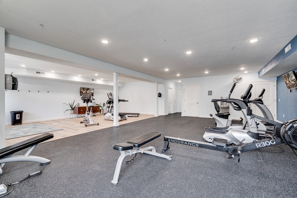 Rowing Machine & Bench At The Fitness Center