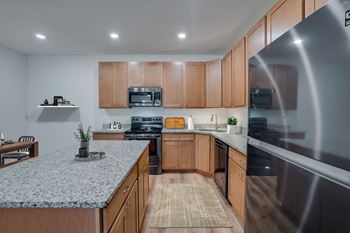 Kitchen with Wood Cabinets