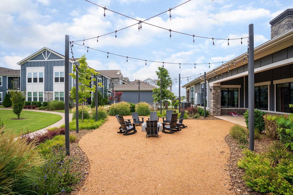 Outdoor Fire Pit Area with String Lights Above