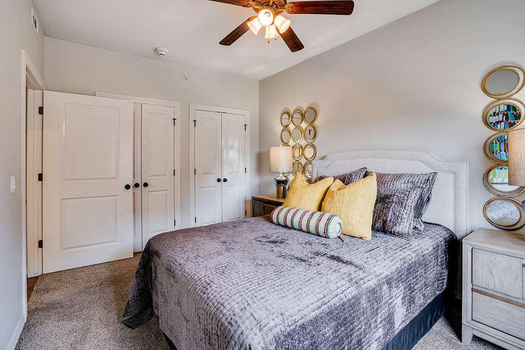 Bedroom with Ceiling Fan and Light