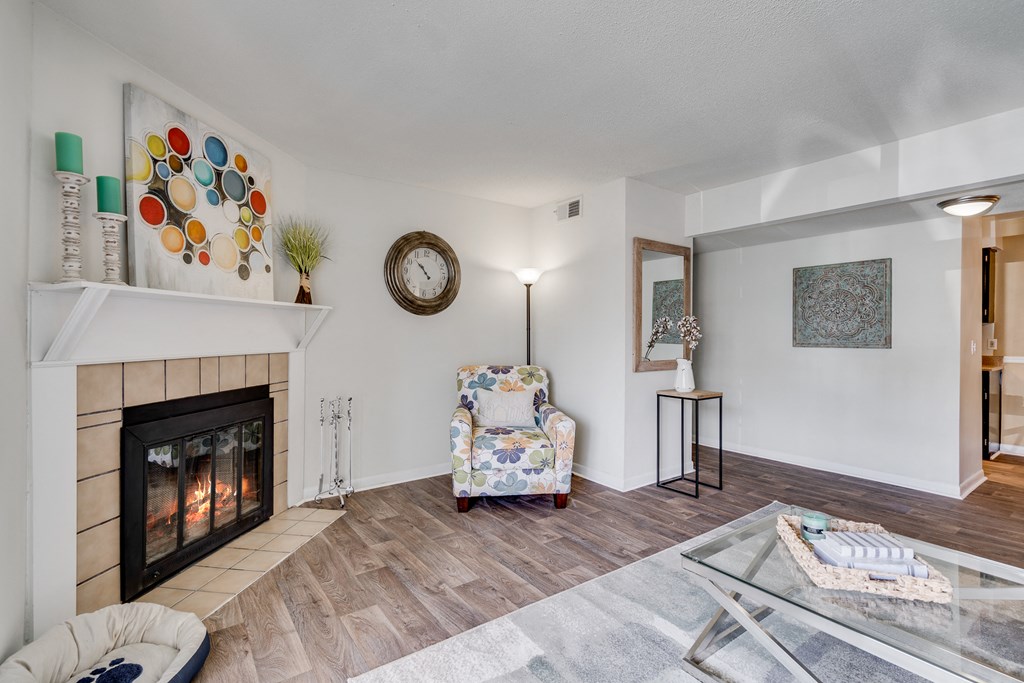 Living Room With Wood-Style Flooring & Fireplace