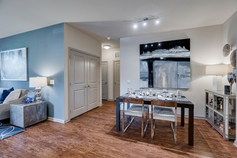 Spacious Dining Area With Wood-Style Flooring