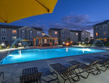Nighttime at the Outdoor Pool Outdoor Pool and Sundeck at Night - Photo Gallery 4