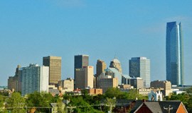 the skyline of the city with skyscrapers and trees