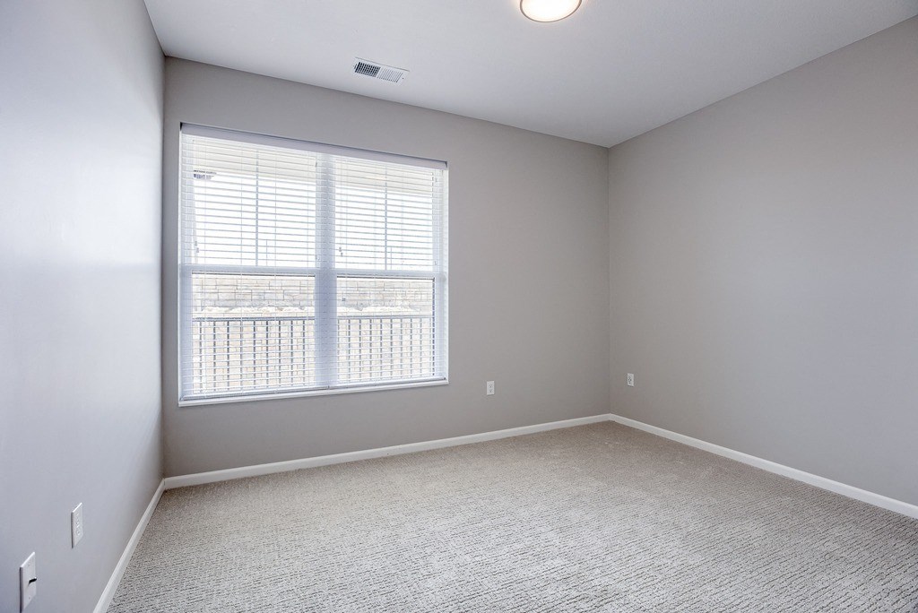 Bedroom with Large Window