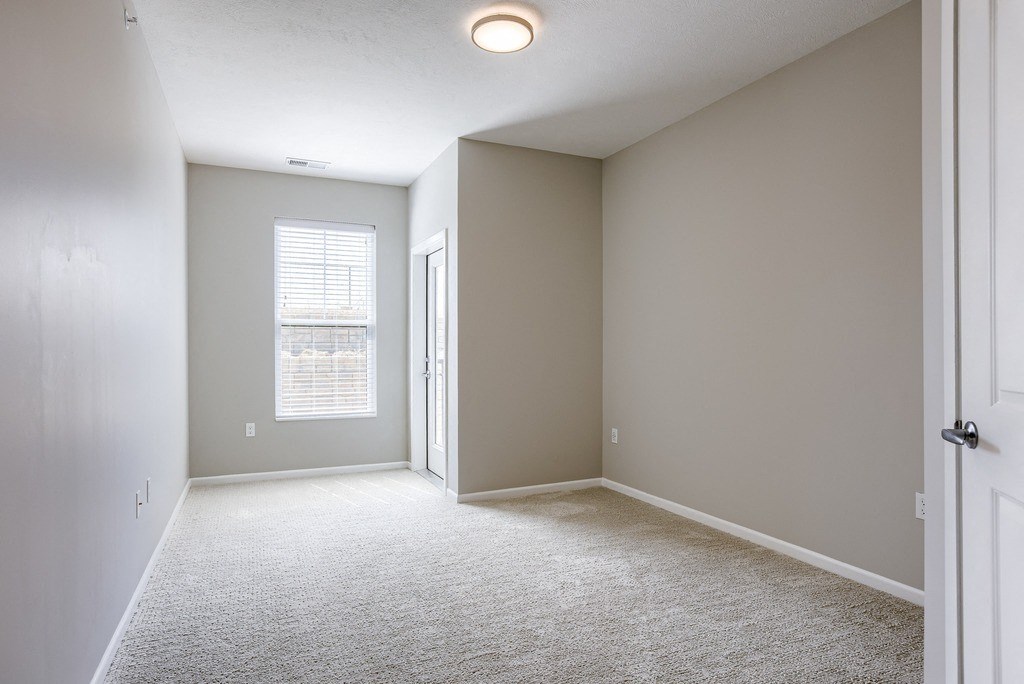 Spacious Bedroom with Plush Carpeting