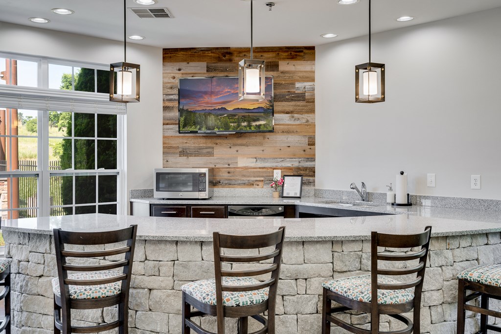 Clubhouse Kitchen With Bar Stool Seating