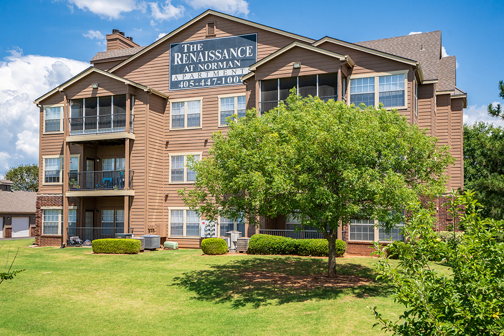 Private Patio and Balconies Overlooking Lush Greenery