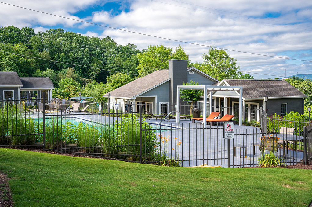 Fenced In Pool Area with Sundeck