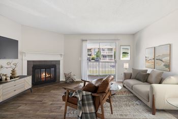 Spacious Living Area With Wood-Style Flooring