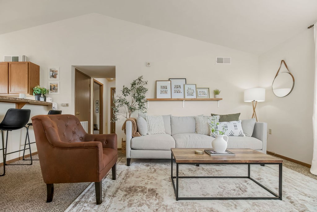 Spacious Living Area with Carpet