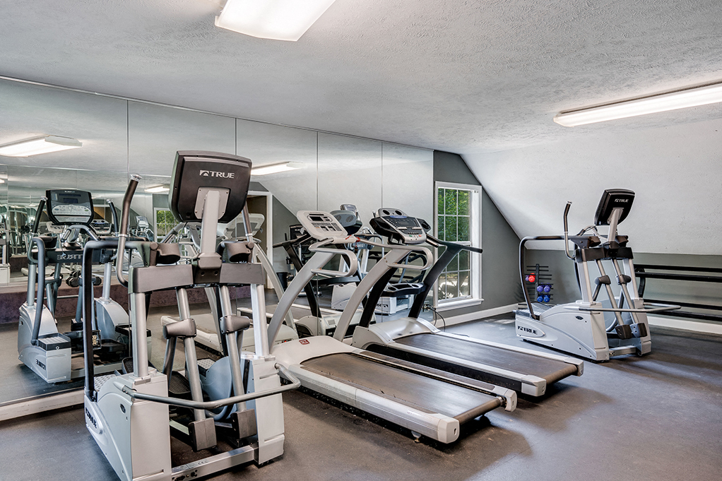 Fitness Center with Large Floor to Ceiling Mirrors