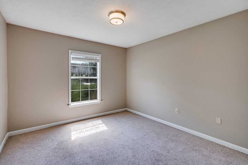 Spacious Bedroom with Taupe Wall Colors