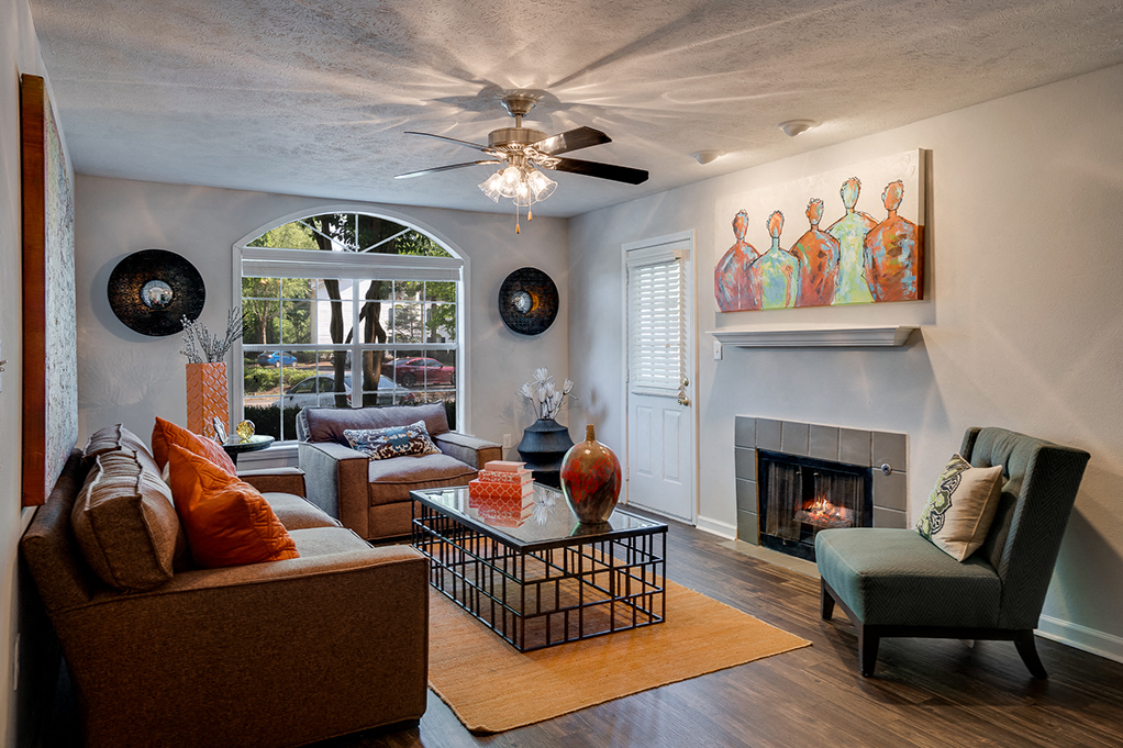 Spacious Living Room with Fireplace and Mantle