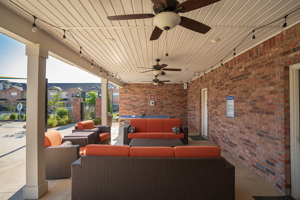 Covered Outdoor Lounge Area with Couches