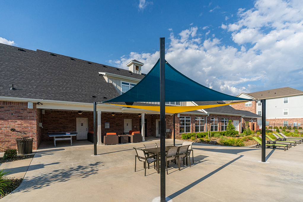 Sun Canopy with Outdoor Dining Table and Chairs