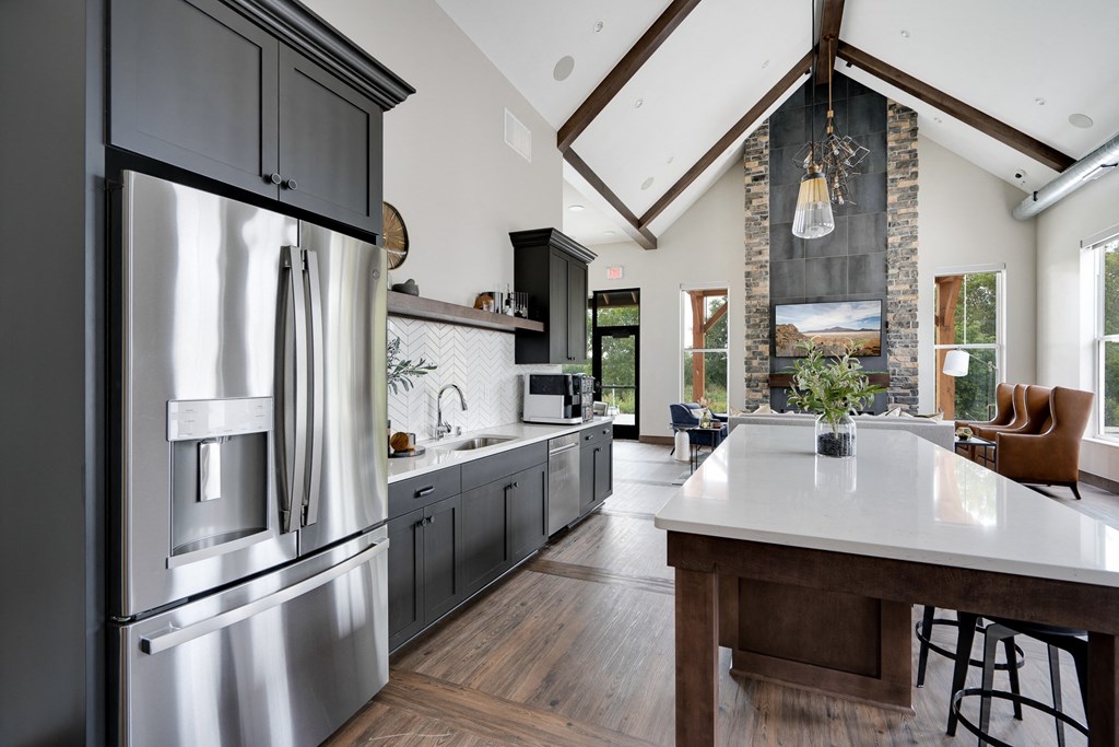 Clubhouse Kitchen with Large Kitchen Island and Stainless Steel Appliances