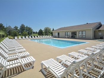 Plenty of Seating on the Sundeck at the Outdoor Pool Outdoor Pool with Plenty of Outdoor Seating - Photo Gallery 3