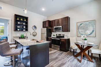 Kitchen with Granite Countertops and Stainless Steel Appliances - Photo Gallery 5