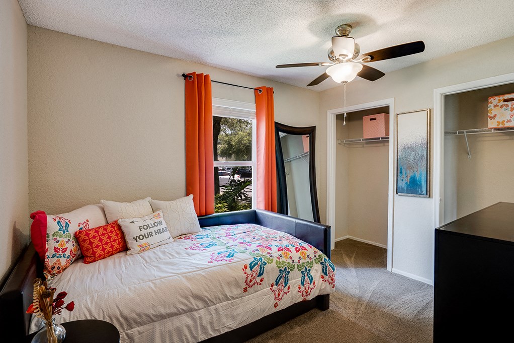 Bedroom with Large Window and Double Closets
