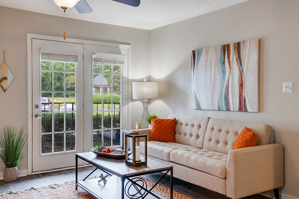 a living room with a couch and a table