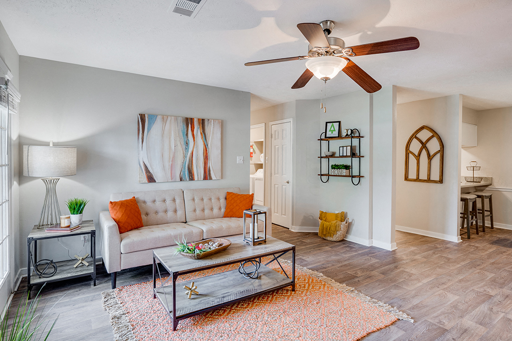 Open Concept Living with Ceiling Fan and Light