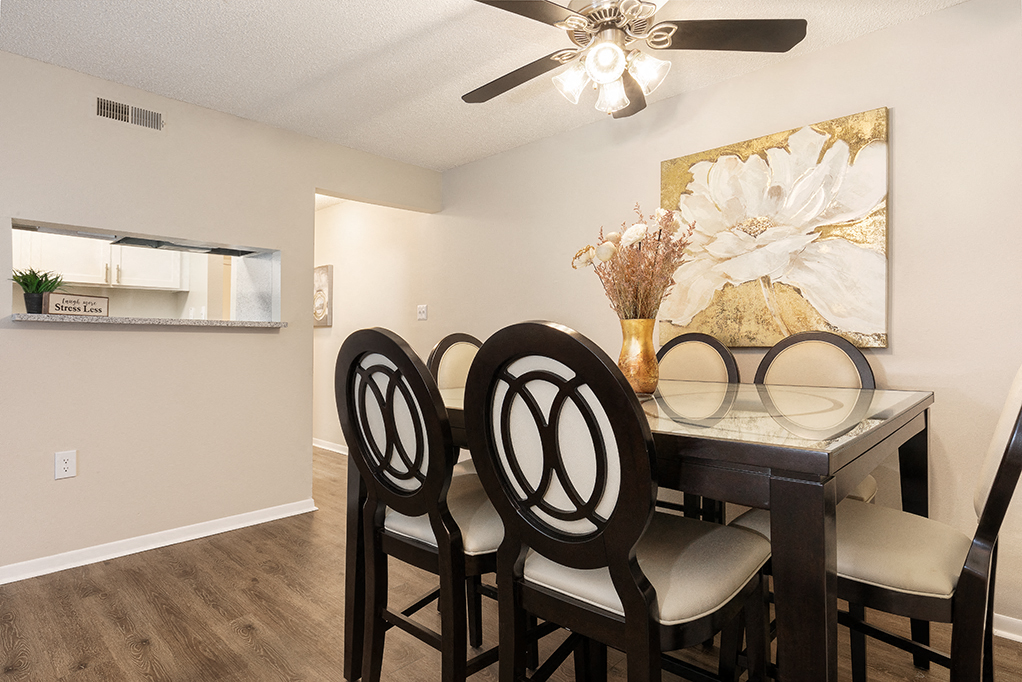 Dining Room Area Adjacent to the Kitchen with Peek Through Window