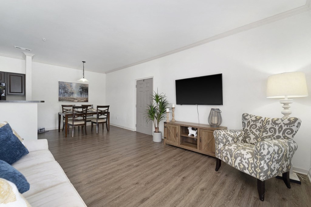 Spacious Living Area with Hardwood-Style Flooring