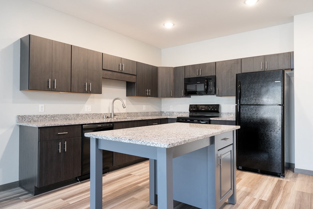 Fully-Equipped Kitchen With Large Island In The Starling Floor Plan