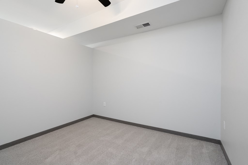 Carpeted Studio Bedroom In The Lark Floor Plan