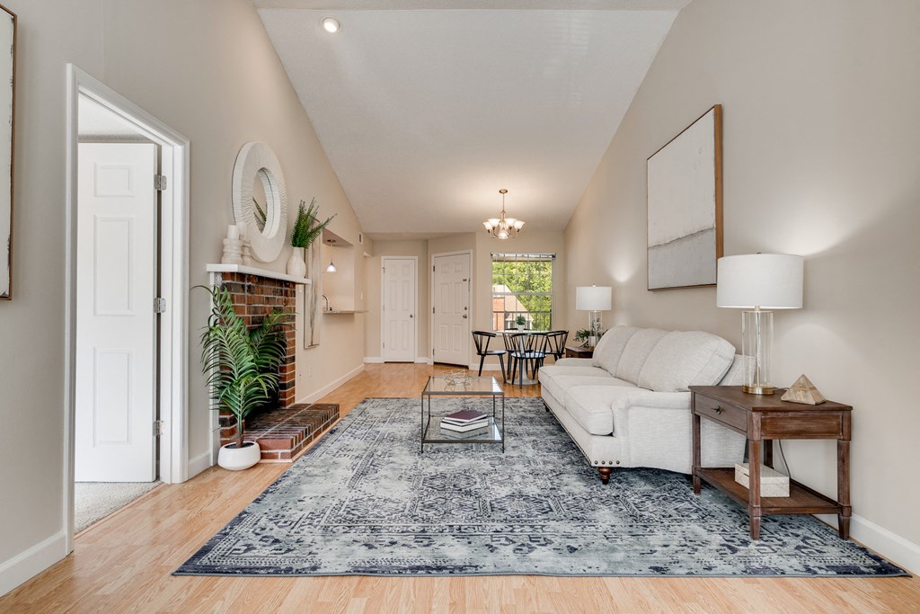 Living Room With Wood-Style Flooring & Fireplace