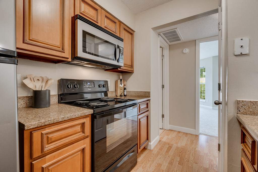 Kitchen With Black & Stainless Appliances