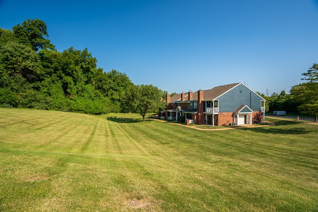 Lush Grass Area Behind Willowbend Apartment Homes