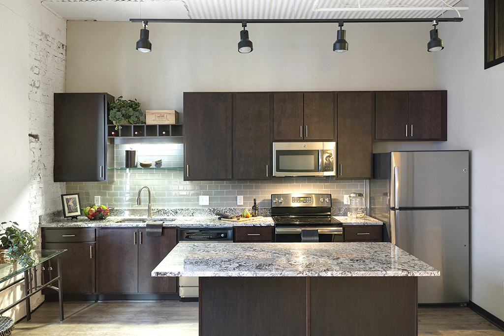 Open Concept Kitchen with Stainless Steel Appliances