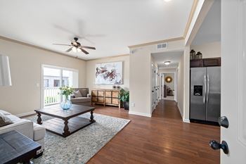 Spacious Living Area with Hardwood-Style Flooring