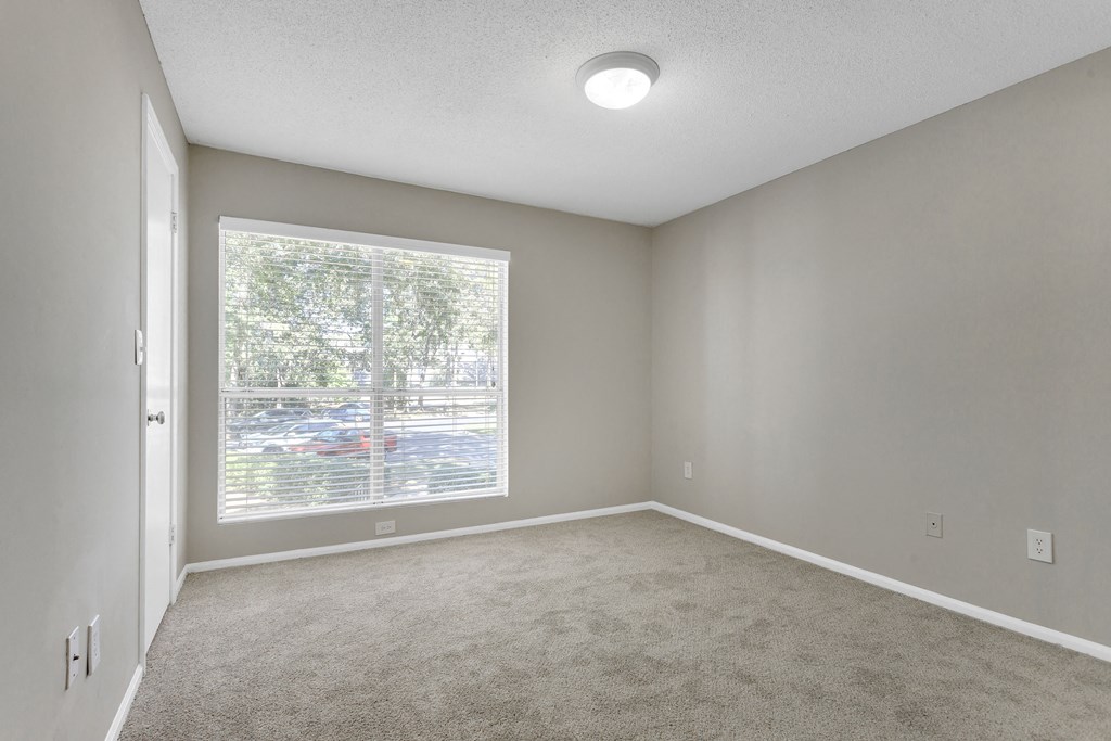 Spacious Bedroom with Large Windows